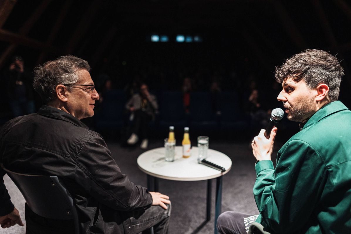 Discussion with the audience at the AFO (Peter Galison on stage with the head of the programme Ondřej Kazík) after the screening of Shattering Stars.