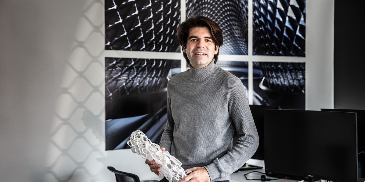 Saman Saffarian is holding the model he first made at Zaha Hadid's studios and she appreciated - you just keep that kind of thing...